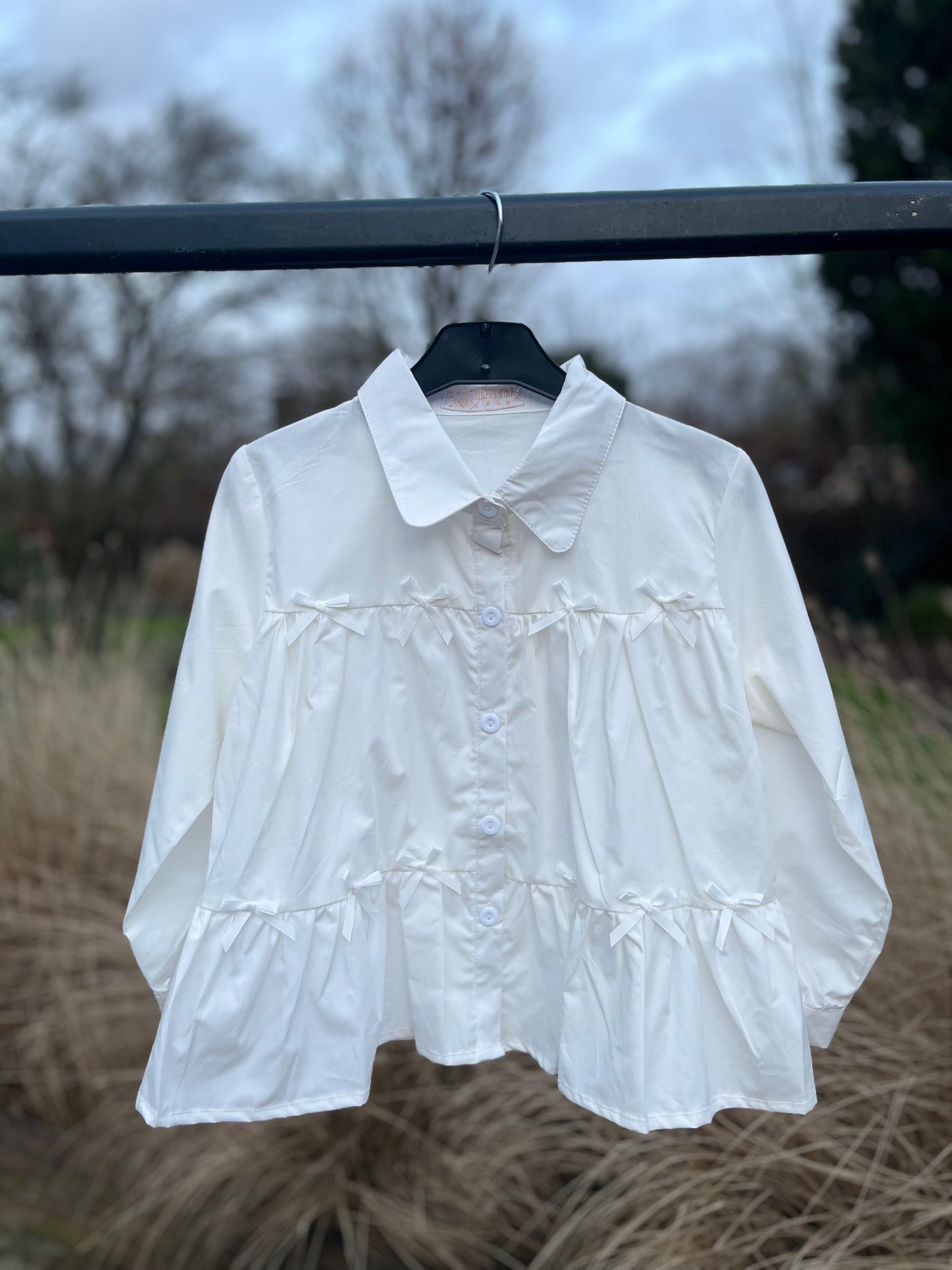 Blouse wit met strikjes