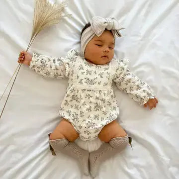 Baby bloemen romper met kant