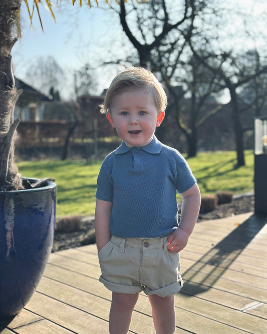 Setje gebreid blauw truitje en zandkleurige broek