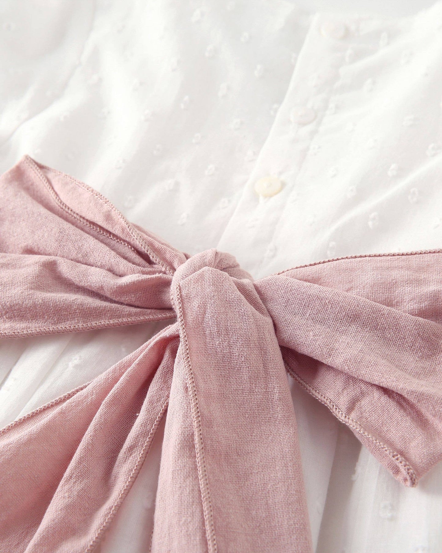 Meisjesjurk plumeti wit met roze strik JGV96848