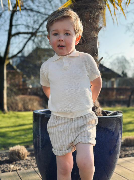 Setje gebreid wit truitje en gestreepte broek