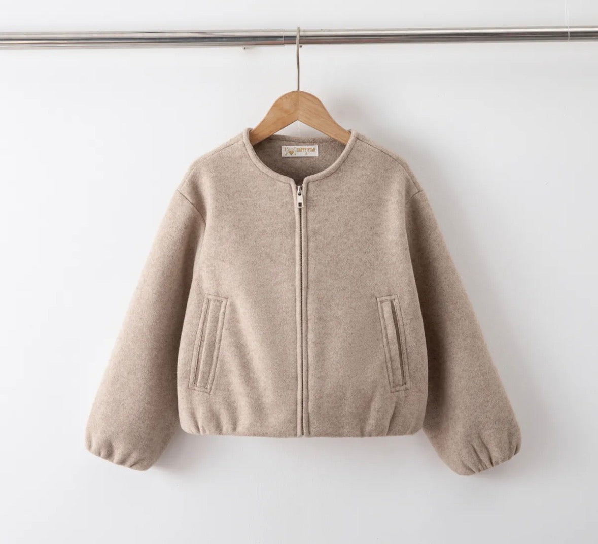 Beige vilte bomberjasje