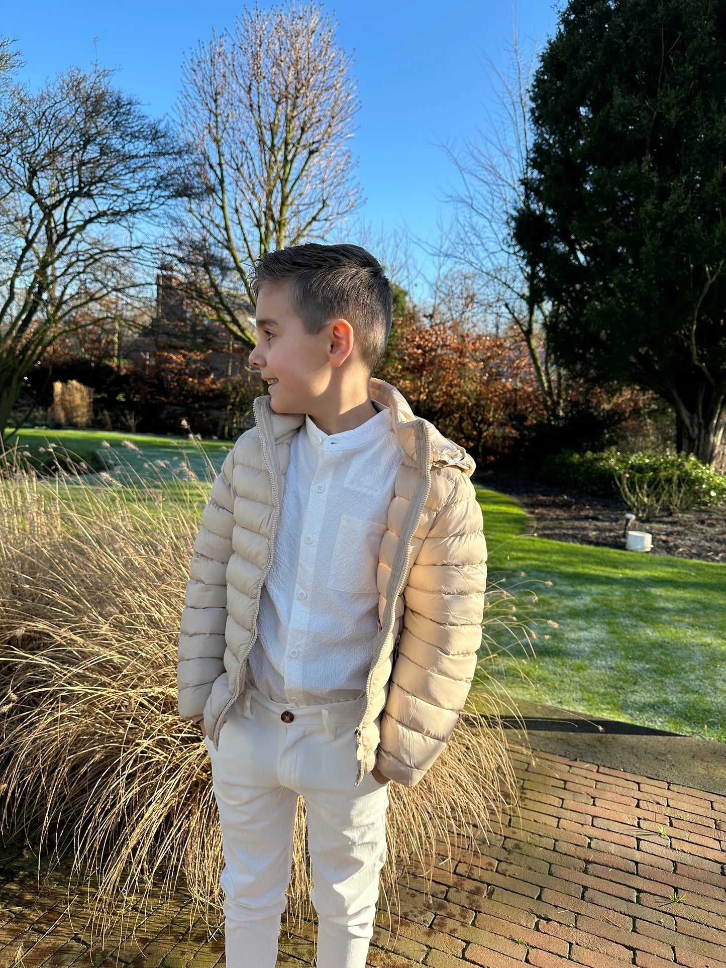 Beige gewatteerde jas