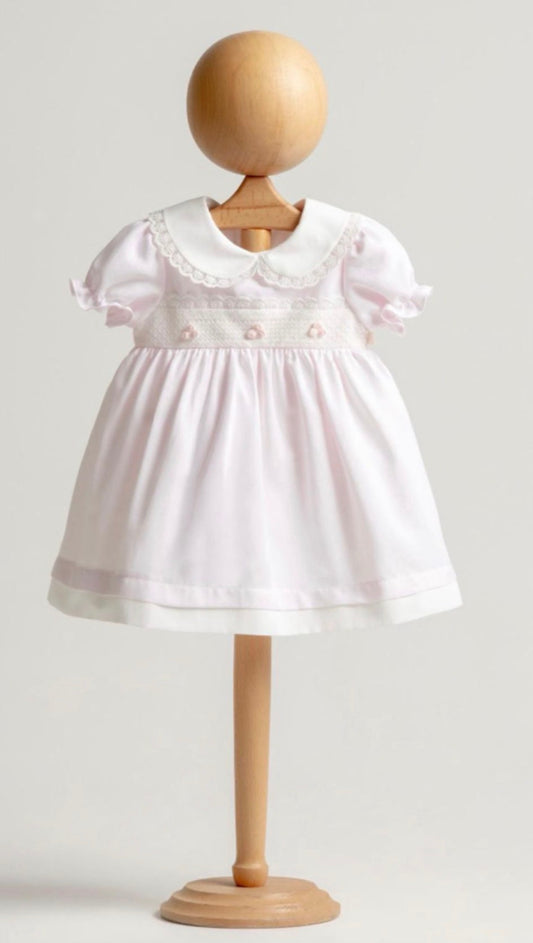 Roze jurkje met pofmouw en bloemetjes